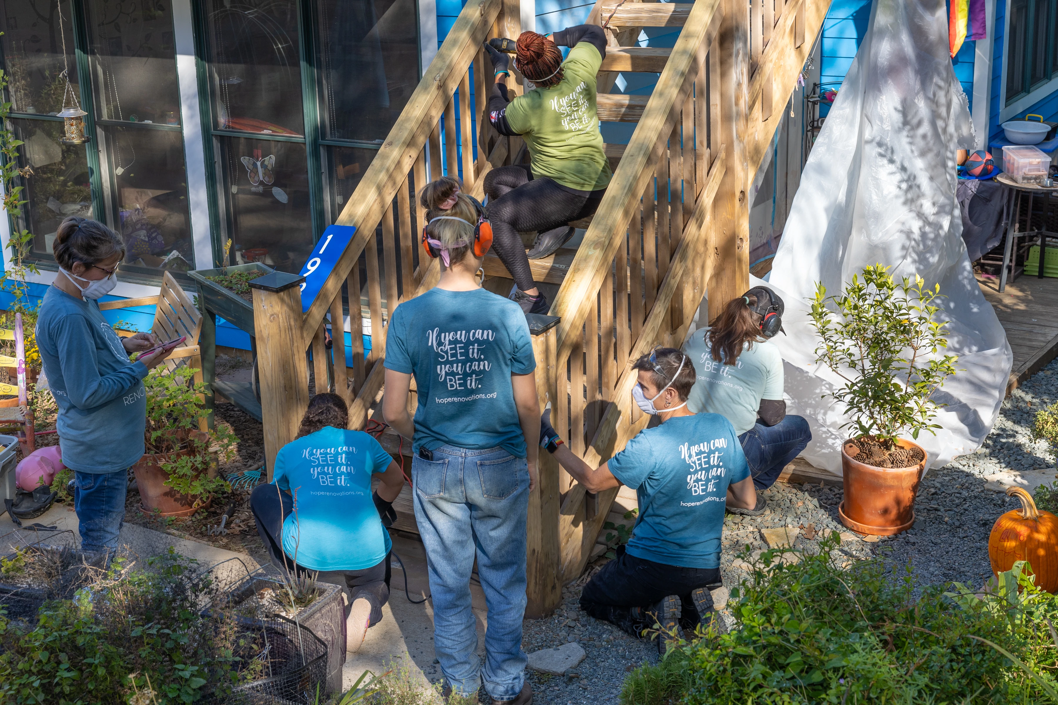 Hope Renovations crew and volunteers working together on a community build